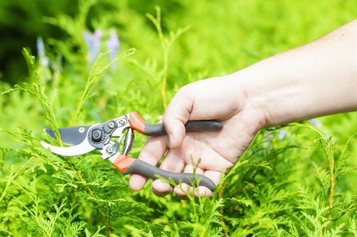 Step-by-step turf installation work in a Docklands apartment or podium garden